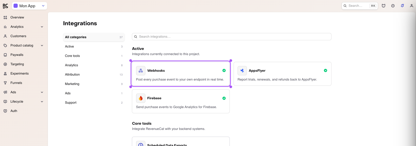 RevenueCat Integrations page with the Webhooks card highlighted.